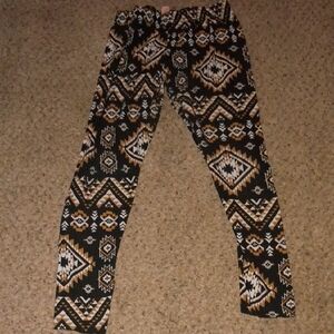 No Boundaries Black and Gold Geometric Leggings
